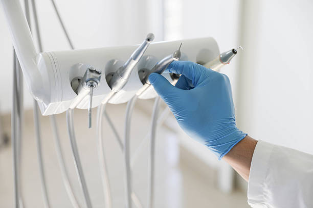 Professional Tooth Extraction technician working in Wilmette, IL